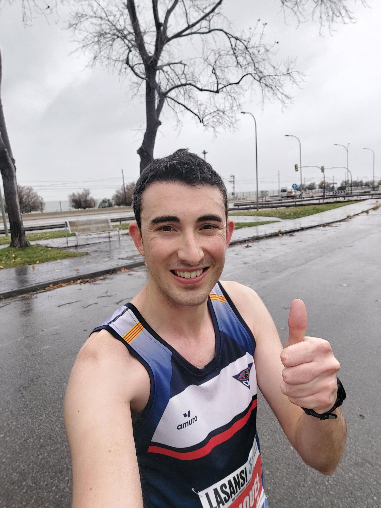 Miquel Batlle Dilmé corriendo con dorsal en carrera popular